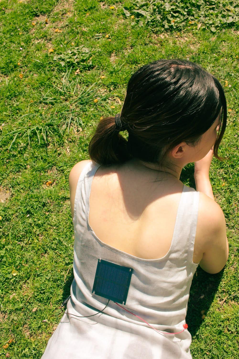 model wearing dress with built-in solar panel